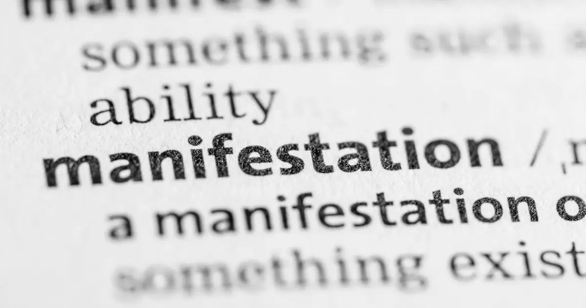 Definition of "manifestation" from a dictionary, highlighting its meaning and relation to the term "manifest."