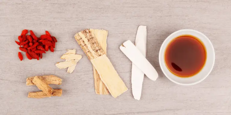 herbs and sticks on a wooden table - immune booster and herbal for health.