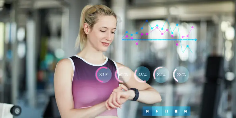 A woman using a health app, focused on serious games, checks her wrist for updates.