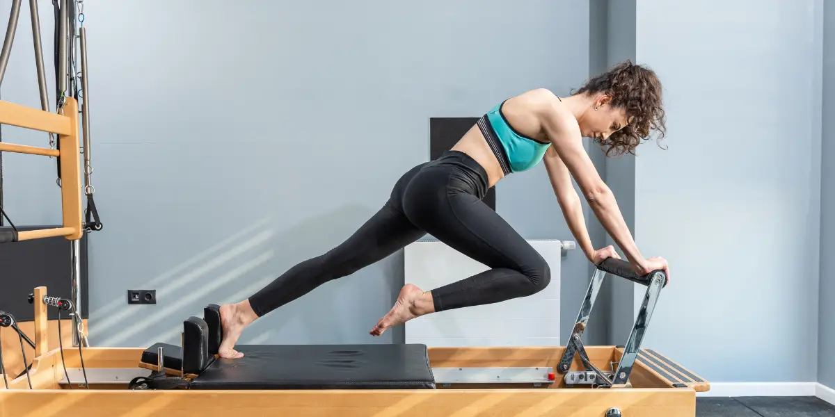 A woman trying to focus on her Pilate exercise and practices
